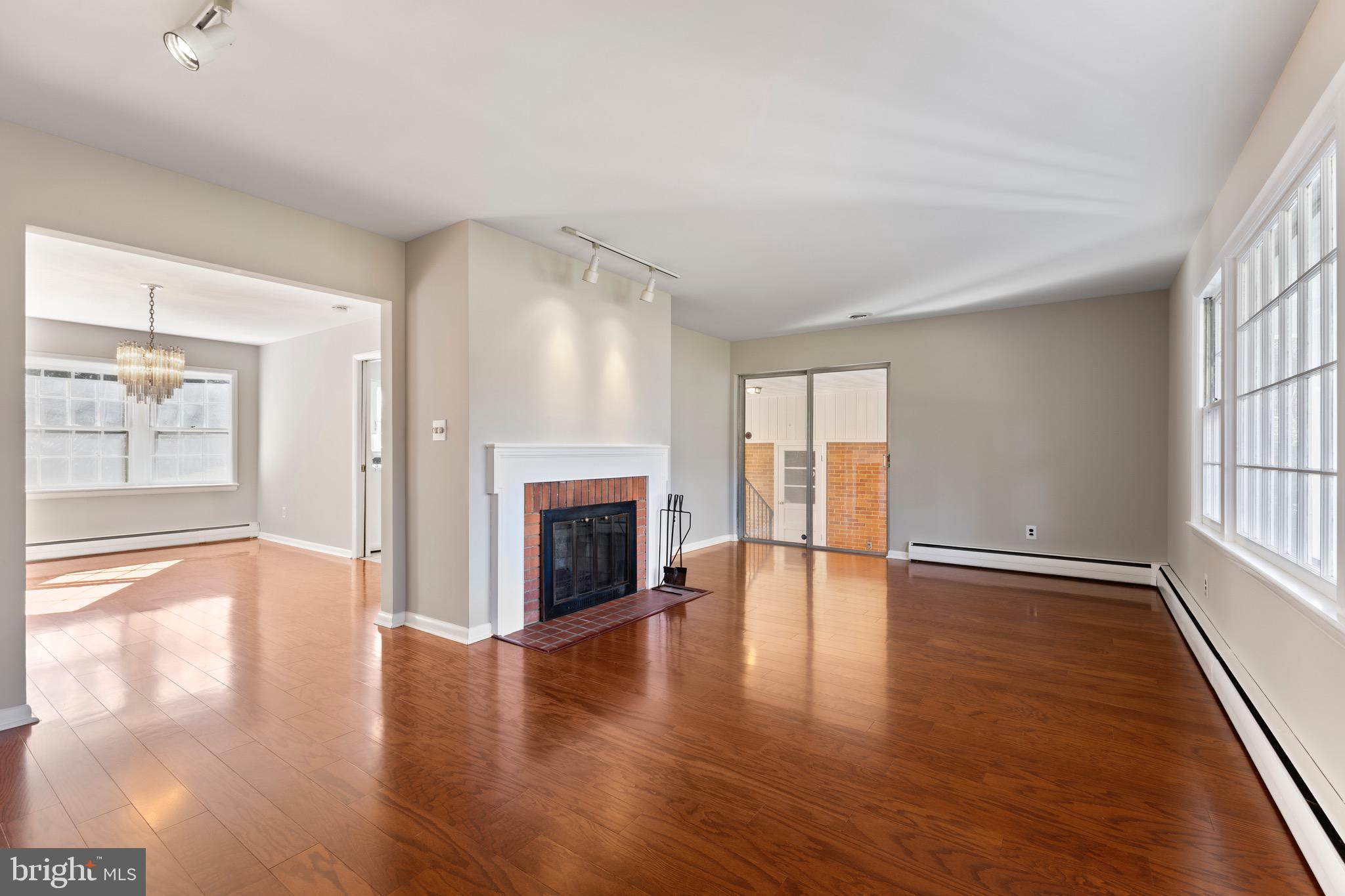 412 Vierling Drive Silver Spring, MD 20904 - Photo 10 of 35 a view of an empty room with window and wooden floor