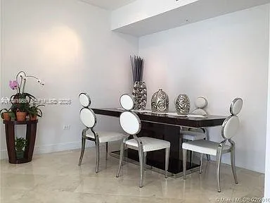 a view of a kitchen area with furniture