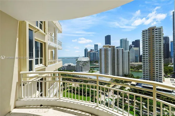 a view of a balcony with city view
