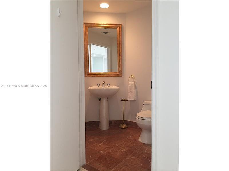 888 Brickell Key Drive, Unit 600 Miami, FL 33131 - Photo 7 of 24 GUEST HALF BATHROOM