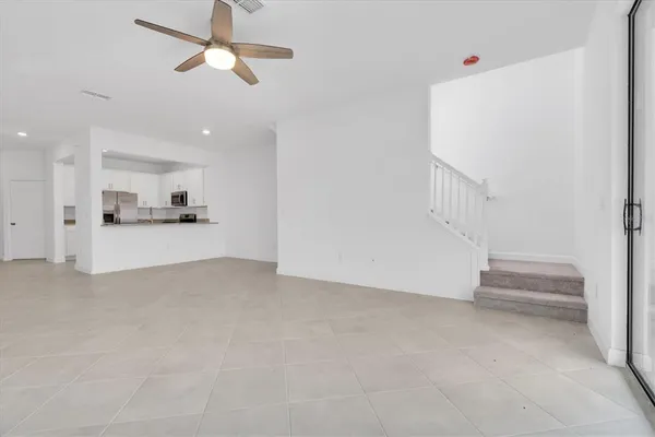 an empty room with closet area