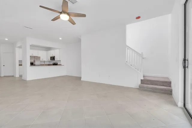 an empty room with closet area