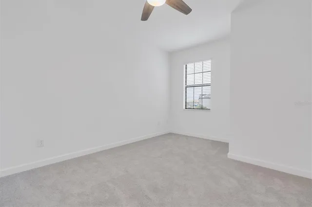 a view of a golf course with a lake