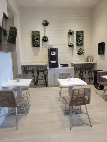 a living room with a couch and a table