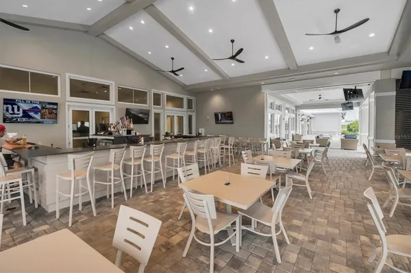 a view of a lake with houses in the back