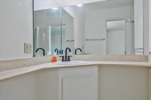 a close view of sink and a vanity