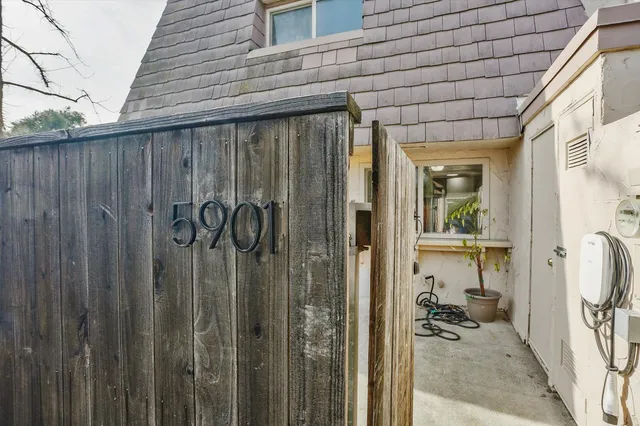 a view of a porch with wooden floor