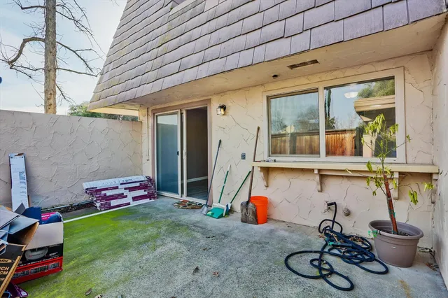 a front view of a house with patio