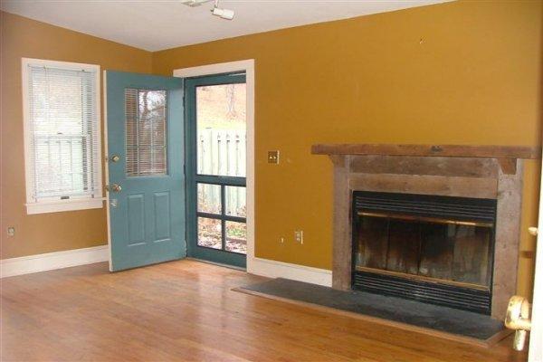 1384 Cherry Valley Road Stroudsburg, PA 18360 - Photo 8 of 18 a view of an empty room with a fireplace and a window