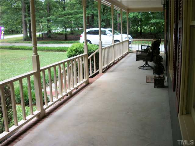 105 Esther Road Roxboro, NC 27573 - Photo 8 of 8 a view of a balcony with yard