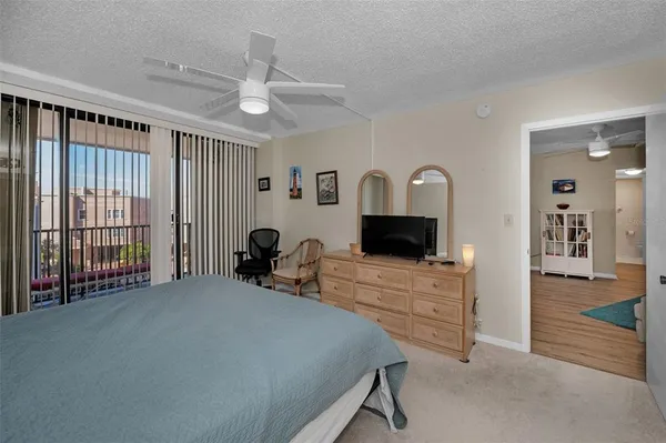 a view of a livingroom with furniture and a workspace