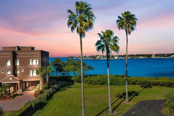 a sign that is on a brick wall