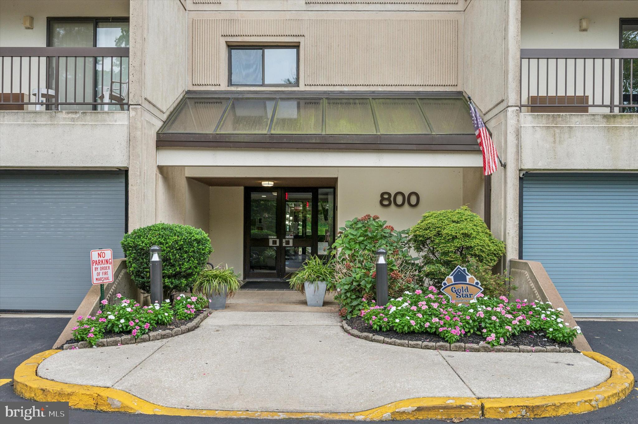 800 Avondale Road, Unit 7J Wallingford, PA 19086 - Photo 1 of 28 Front of building/ comes with 2 garage spaces