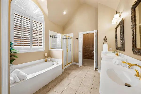 a bathroom with a bathtub and a sink