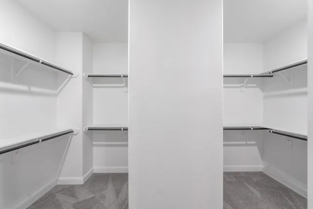 a view of an empty walk in closet