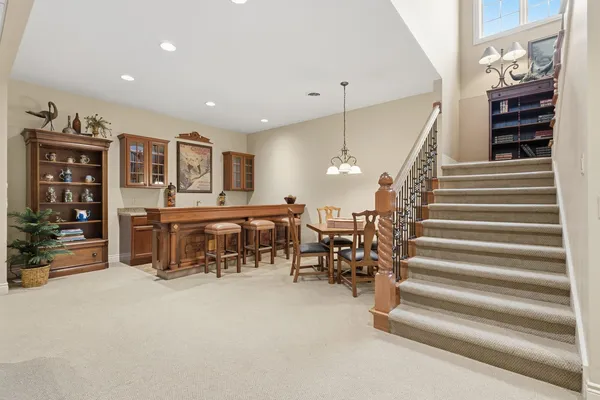 a view of dining room with furniture and entryway