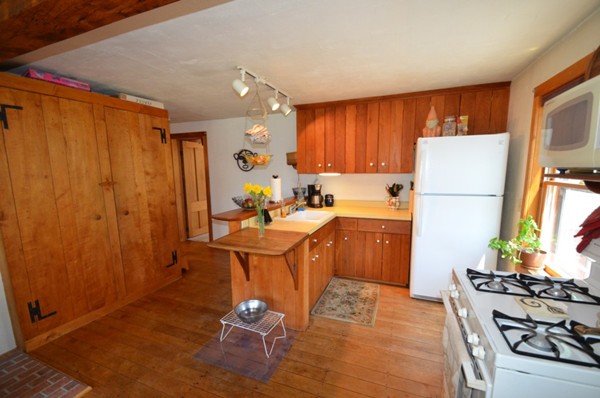 34 Chestnut Hill Road Leverett, MA 01054 - Photo 11 of 29 a kitchen with a sink appliances and cabinets