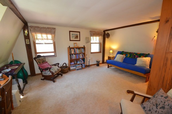 34 Chestnut Hill Road Leverett, MA 01054 - Photo 15 of 29 a living room with furniture and a window
