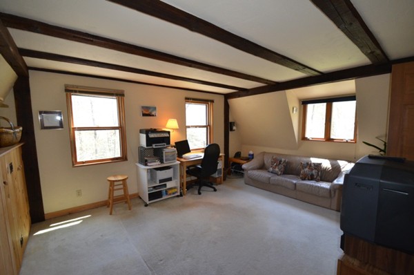 34 Chestnut Hill Road Leverett, MA 01054 - Photo 18 of 29 a living room with furniture and a window