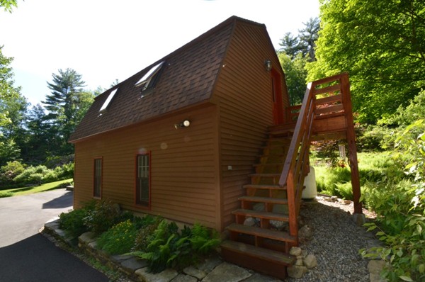 34 Chestnut Hill Road Leverett, MA 01054 - Photo 22 of 29 a view of a house with a yard