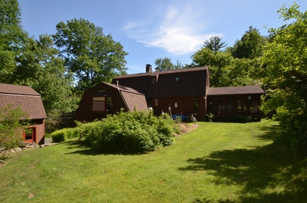 34 Chestnut Hill Road Leverett, MA 01054 - Photo 24 of 29 front view of a house with a yard