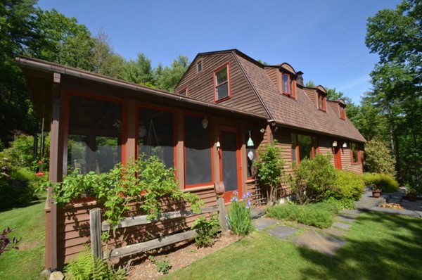 34 Chestnut Hill Road Leverett, MA 01054 - Photo 4 of 29 a front view of a house with garden