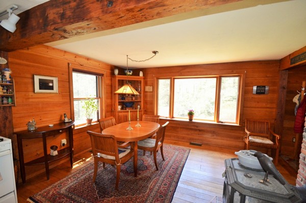 34 Chestnut Hill Road Leverett, MA 01054 - Photo 9 of 29 a dining room with furniture and wooden floor