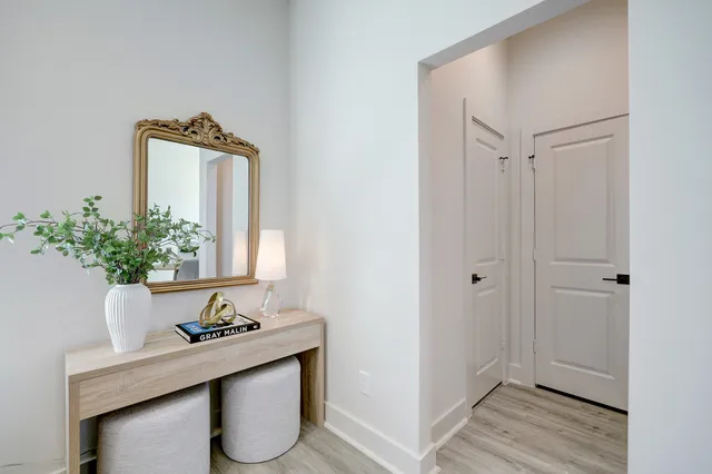 a view of bathroom with sink and mirror
