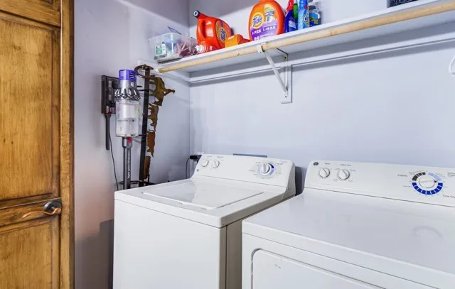 a aerial view of a house with a yard balcony