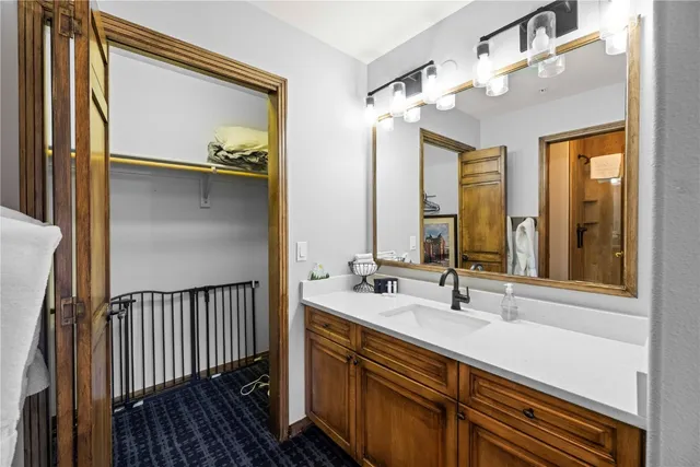 a bathroom with a tub and shower