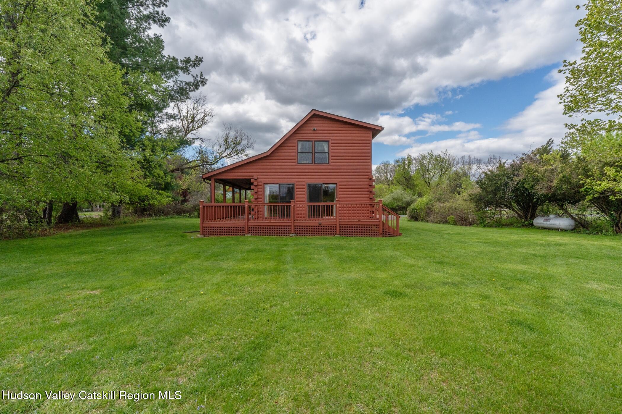 140 Stone Dock Road High Falls, NY 12440 - Photo 38 of 42 a front view of a house with a yard