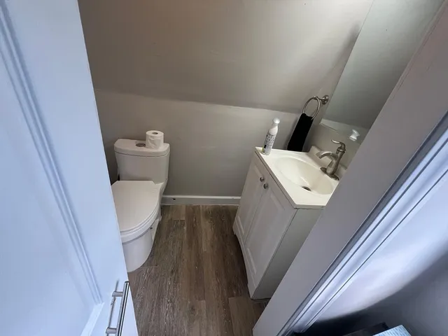 a bathroom with a toilet and a sink