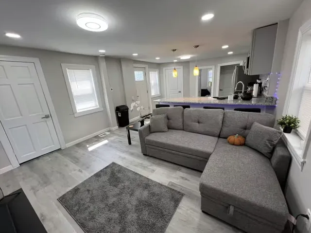 a living room with furniture and a couch