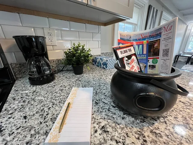 a room with furniture and a rug