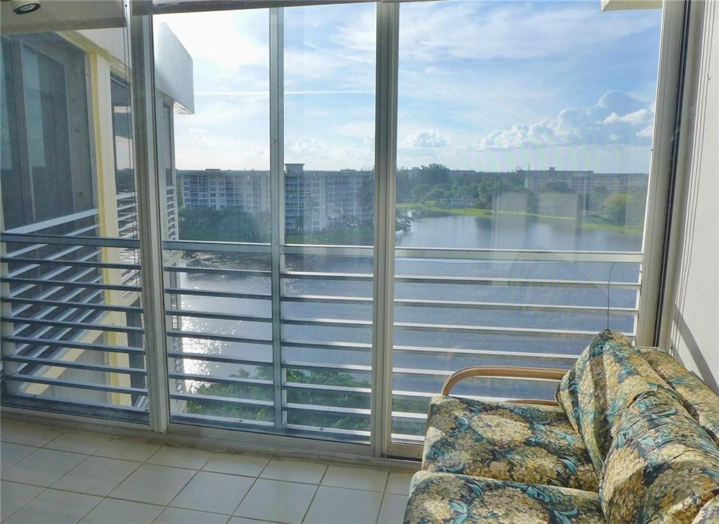 3095 North Course Drive, Unit 1005 Pompano Beach, FL 33069 - Photo 16 of 32 Patio with Lake view