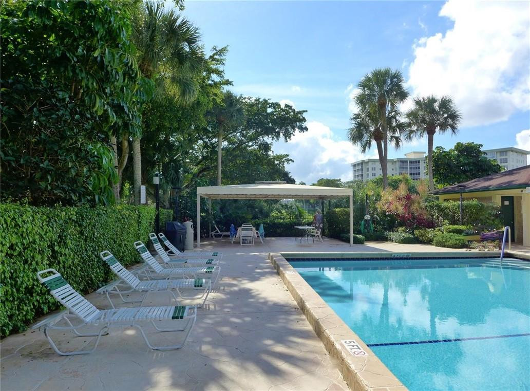 3095 North Course Drive, Unit 1005 Pompano Beach, FL 33069 - Photo 25 of 32 Heated Pool 2 - Private for building 52