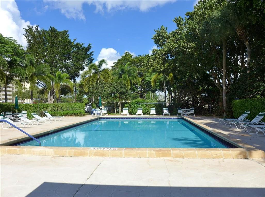 3095 North Course Drive, Unit 1005 Pompano Beach, FL 33069 - Photo 26 of 32 Heated Pool 3 - Private for building 52