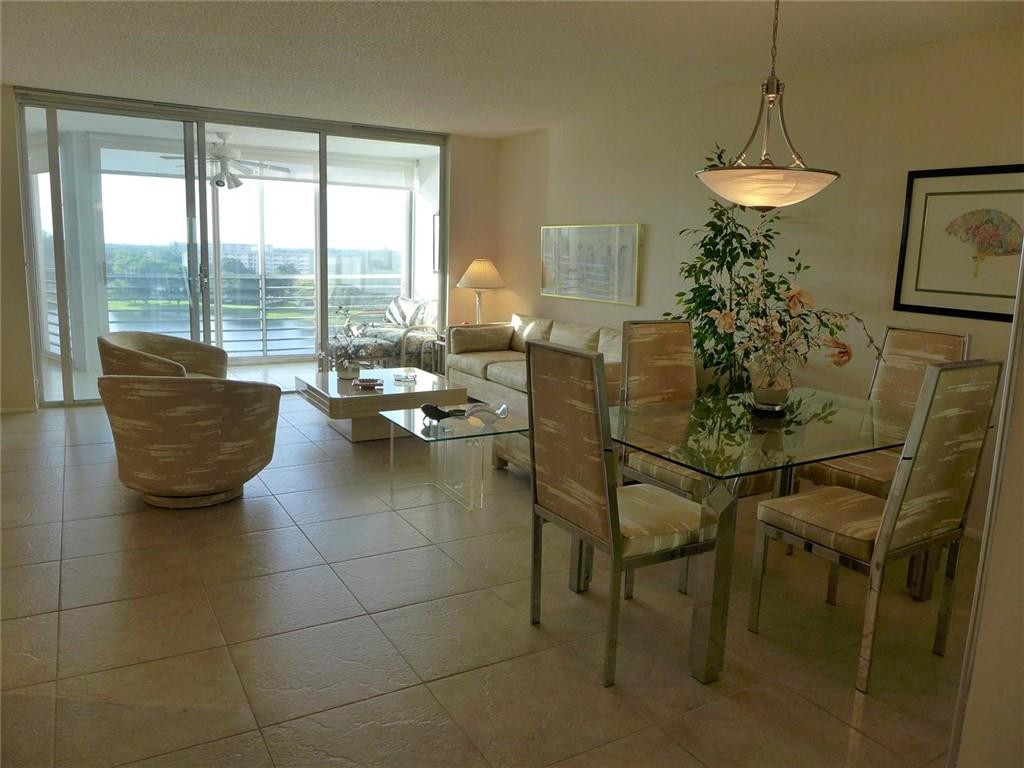 3095 North Course Drive, Unit 1005 Pompano Beach, FL 33069 - Photo 6 of 32 Dining to Living Area