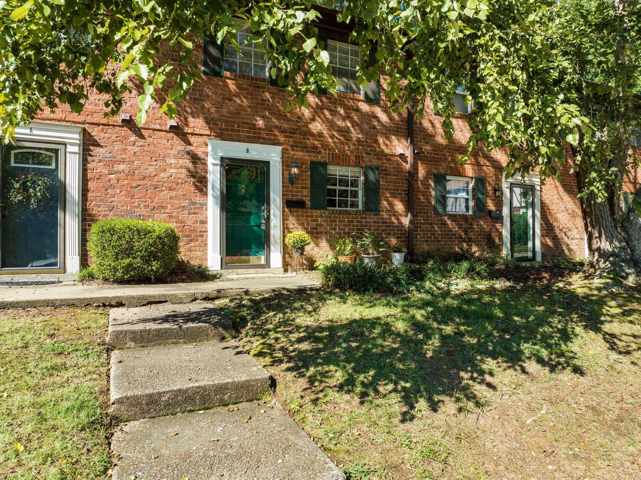1209 Manassas Court, Unit B Raleigh, NC 27609 - Photo 2 of 34 front view of a house with a yard