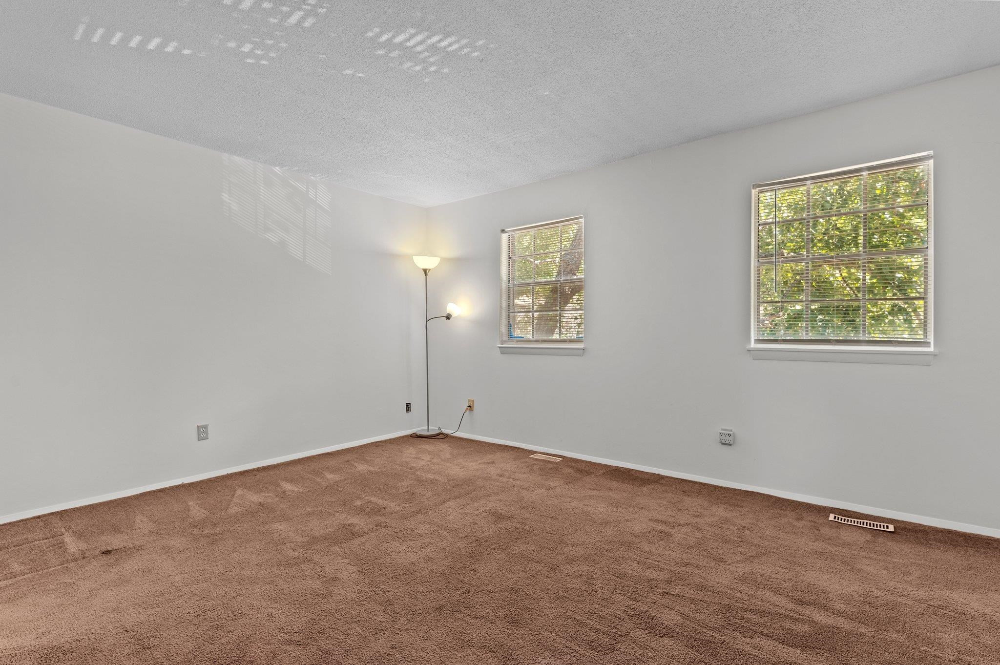 1209 Manassas Court, Unit B Raleigh, NC 27609 - Photo 24 of 34 a view of an empty room with a window