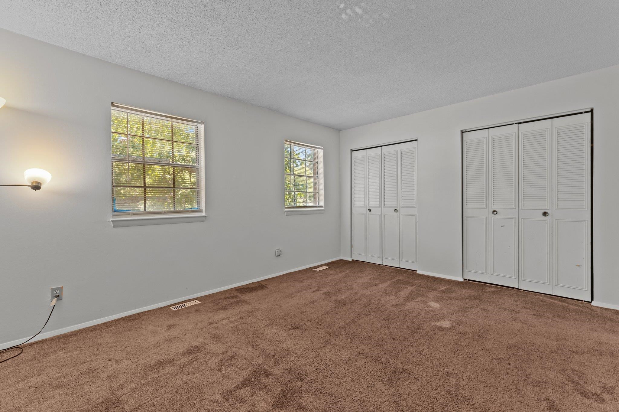 1209 Manassas Court, Unit B Raleigh, NC 27609 - Photo 25 of 34 a view of an empty room with a window