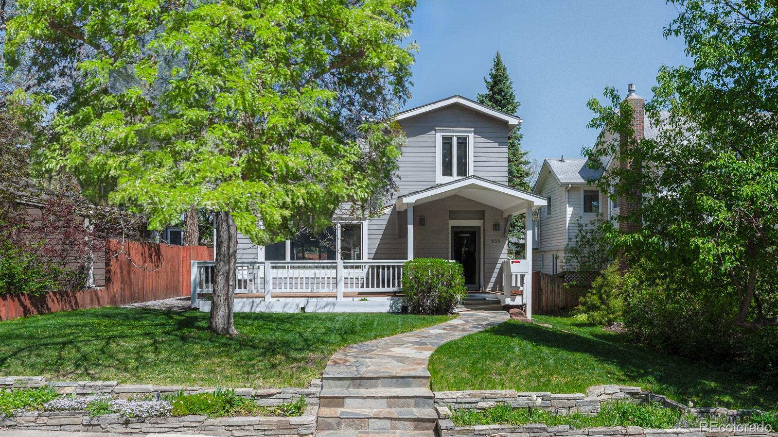 1835 Columbine Avenue Boulder, CO 80302 - Photo 1 of 40 a front view of a house with a yard