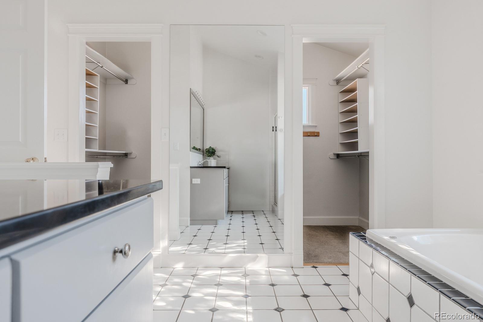 1835 Columbine Avenue Boulder, CO 80302 - Photo 29 of 40 a bathroom with a sink a toilet and a shower