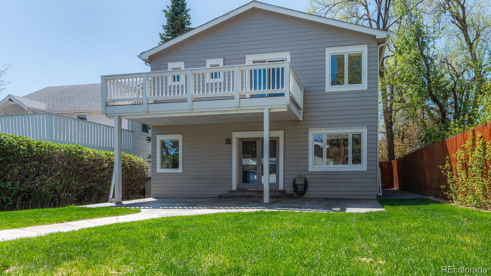 1835 Columbine Avenue Boulder, CO 80302 - Photo 34 of 40 a front view of a house with a garden