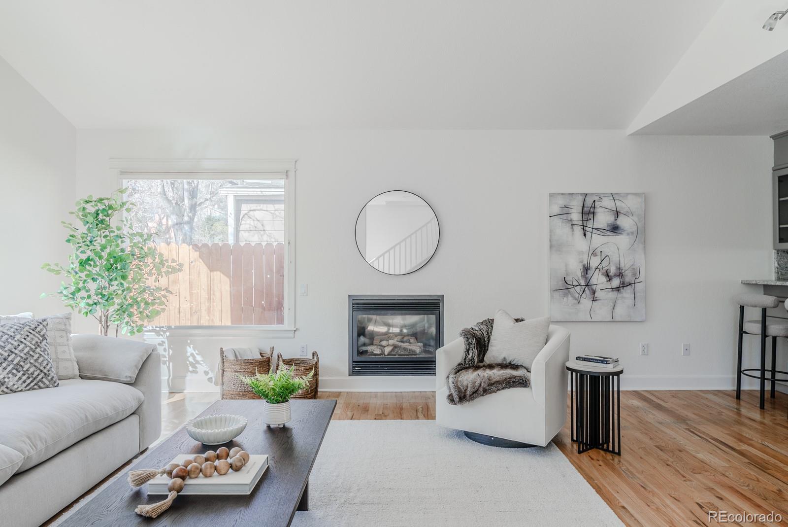 1835 Columbine Avenue Boulder, CO 80302 - Photo 5 of 40 a living room with furniture and a fireplace