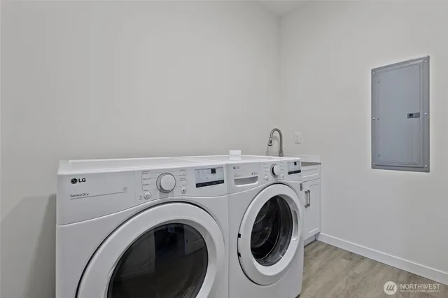 a utility room with dryer and washer