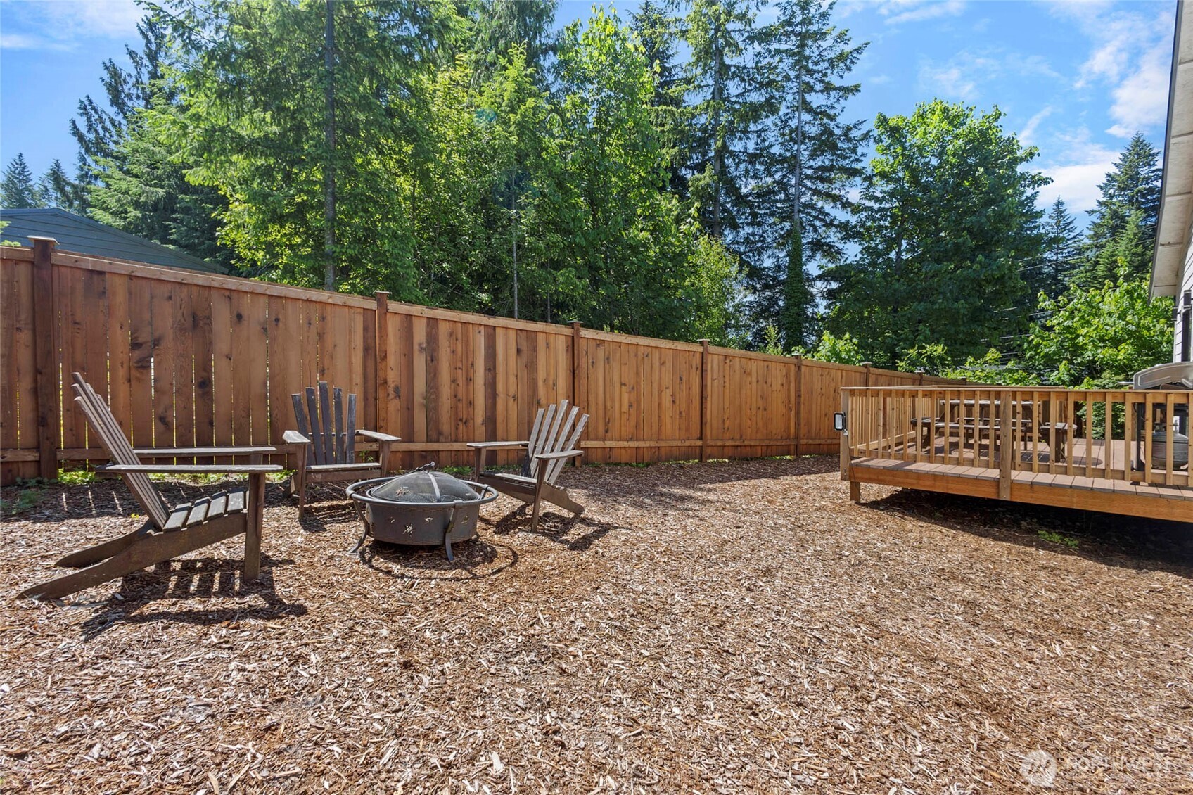 7952 Apache Drive Maple Falls, WA 98266 - Photo 21 of 28 a view of a backyard with a bench