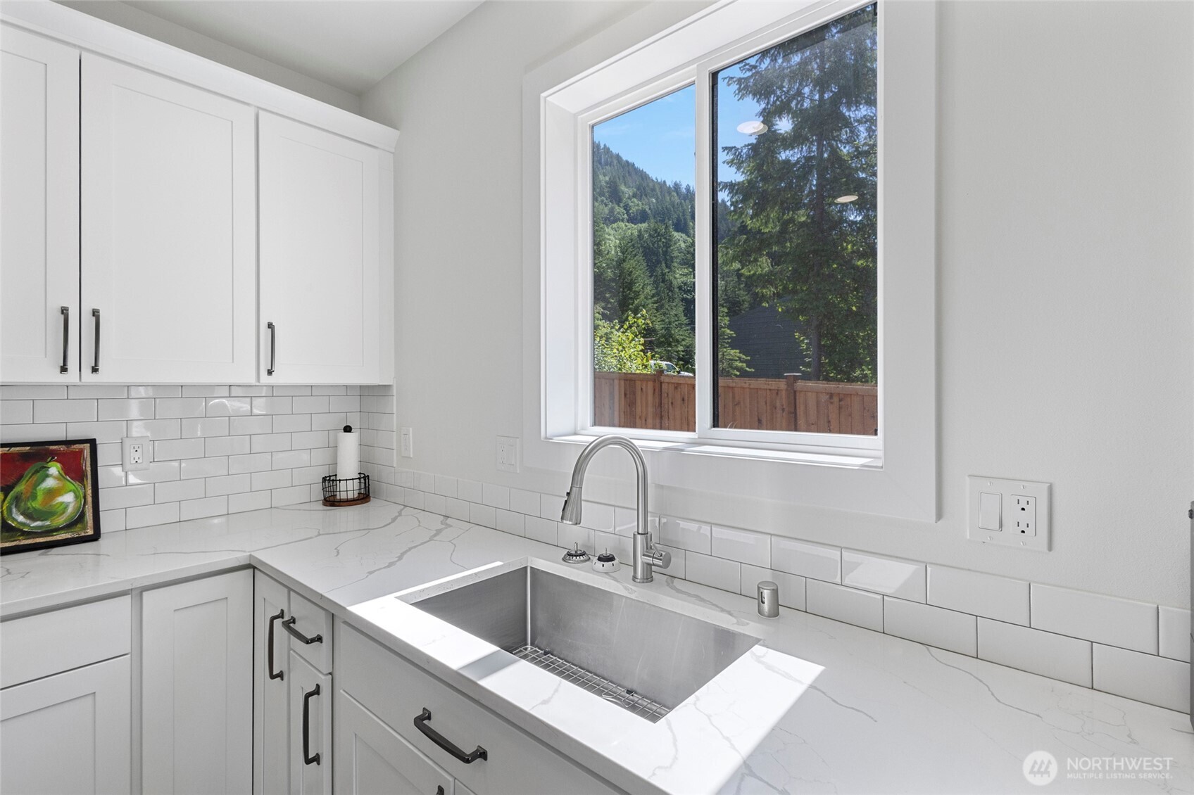 7952 Apache Drive Maple Falls, WA 98266 - Photo 9 of 28 a kitchen with a sink and cabinets