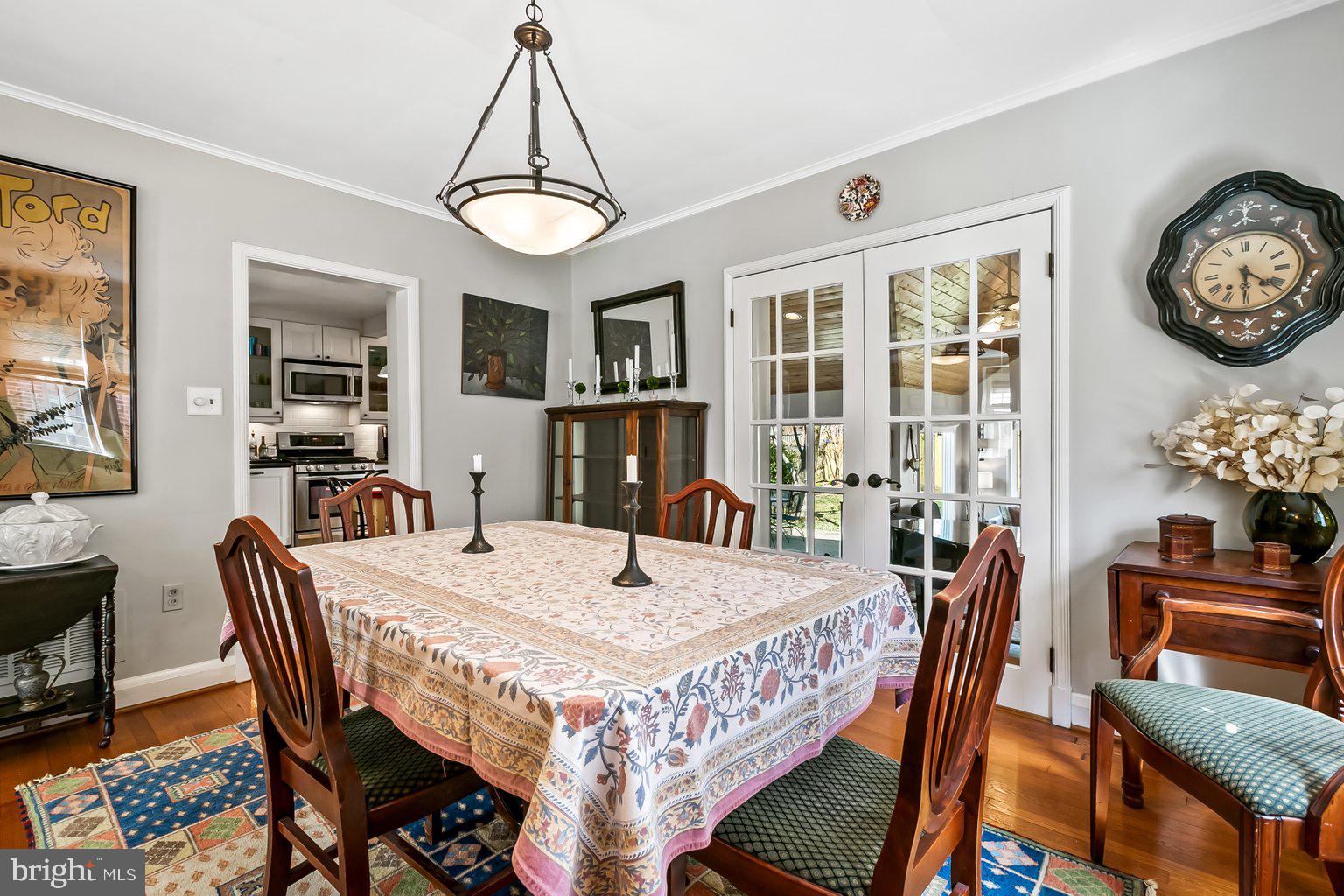 620 Overbrook Road Baltimore, MD 21212 - Photo 13 of 53 a view of a dining room with furniture window and wooden floor