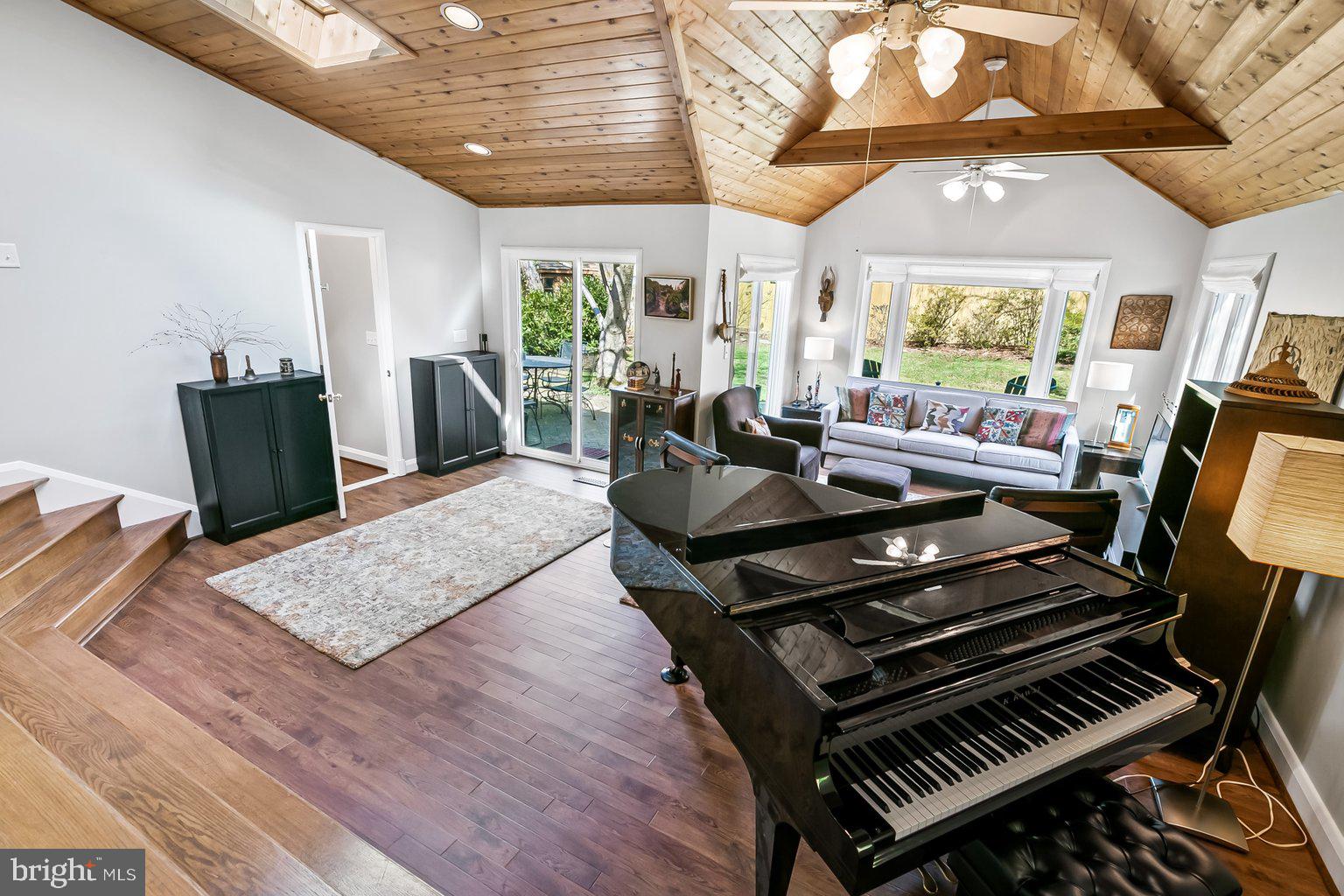 620 Overbrook Road Baltimore, MD 21212 - Photo 22 of 53 a living room with furniture and a flat screen tv